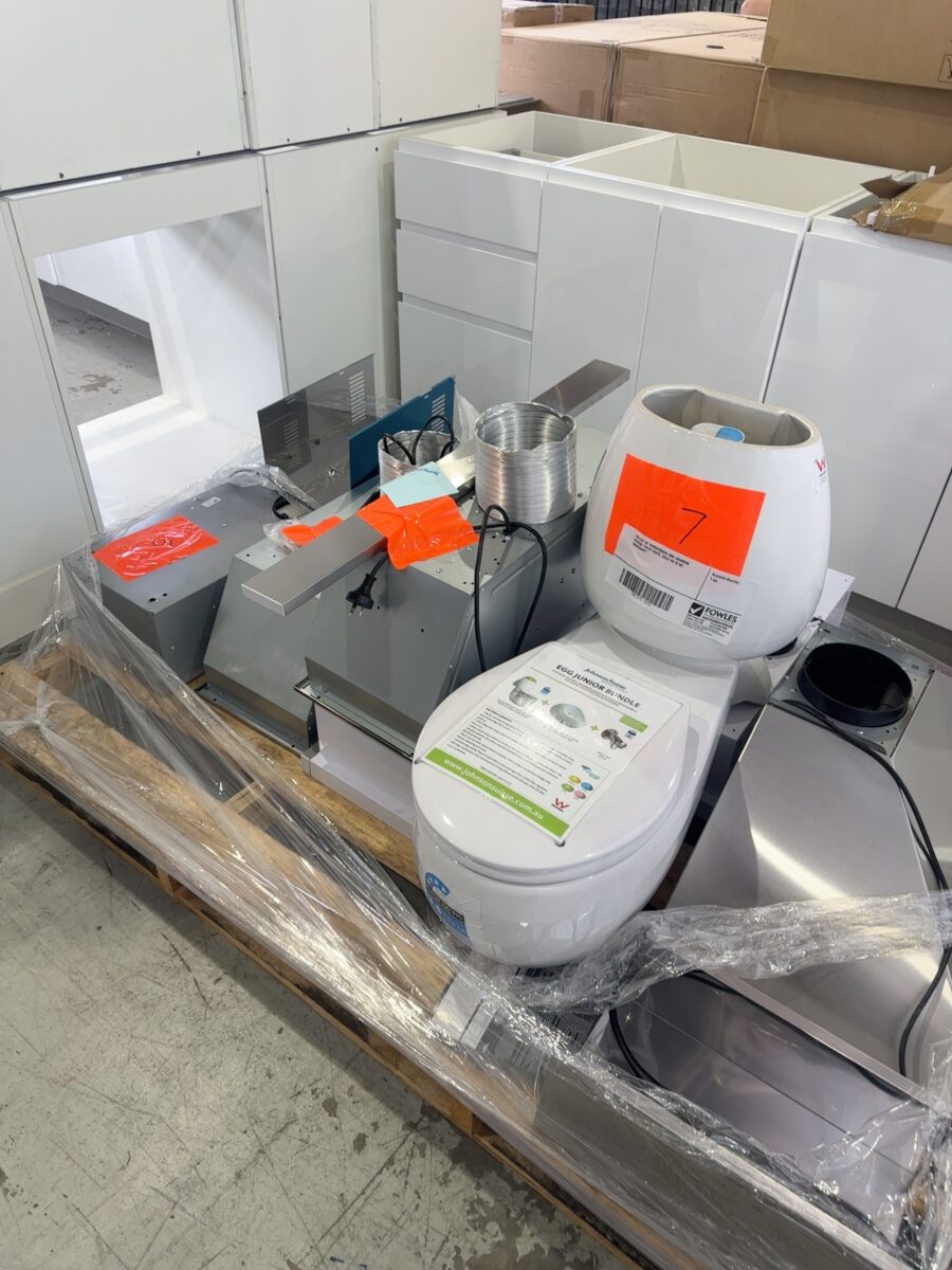 PALLET OF RANGEHOODS AND JOHNSON SUISSE TOILET SUITE, SOLD AS IS NO WARRANTY