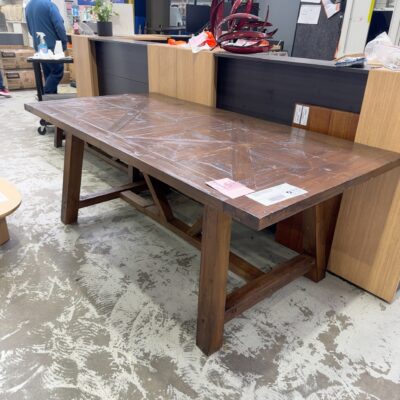 EX HIRE DARK TIMBER RUSTIC FRENCH STYLE DINING TABLE, HERRINGBONE TOP, 2000MM X 1000MM WITH 2 X MATCHING BENCH SEATS SOLD AS IS