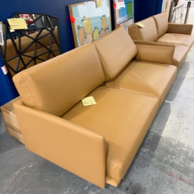 EX STAGING HIRE - TAN VINYL MID CENTURY STYLE 2 SEATER COUCH, SOLD AS IS **SOME SMALL MARKS, RUBS, SCRATCHES**