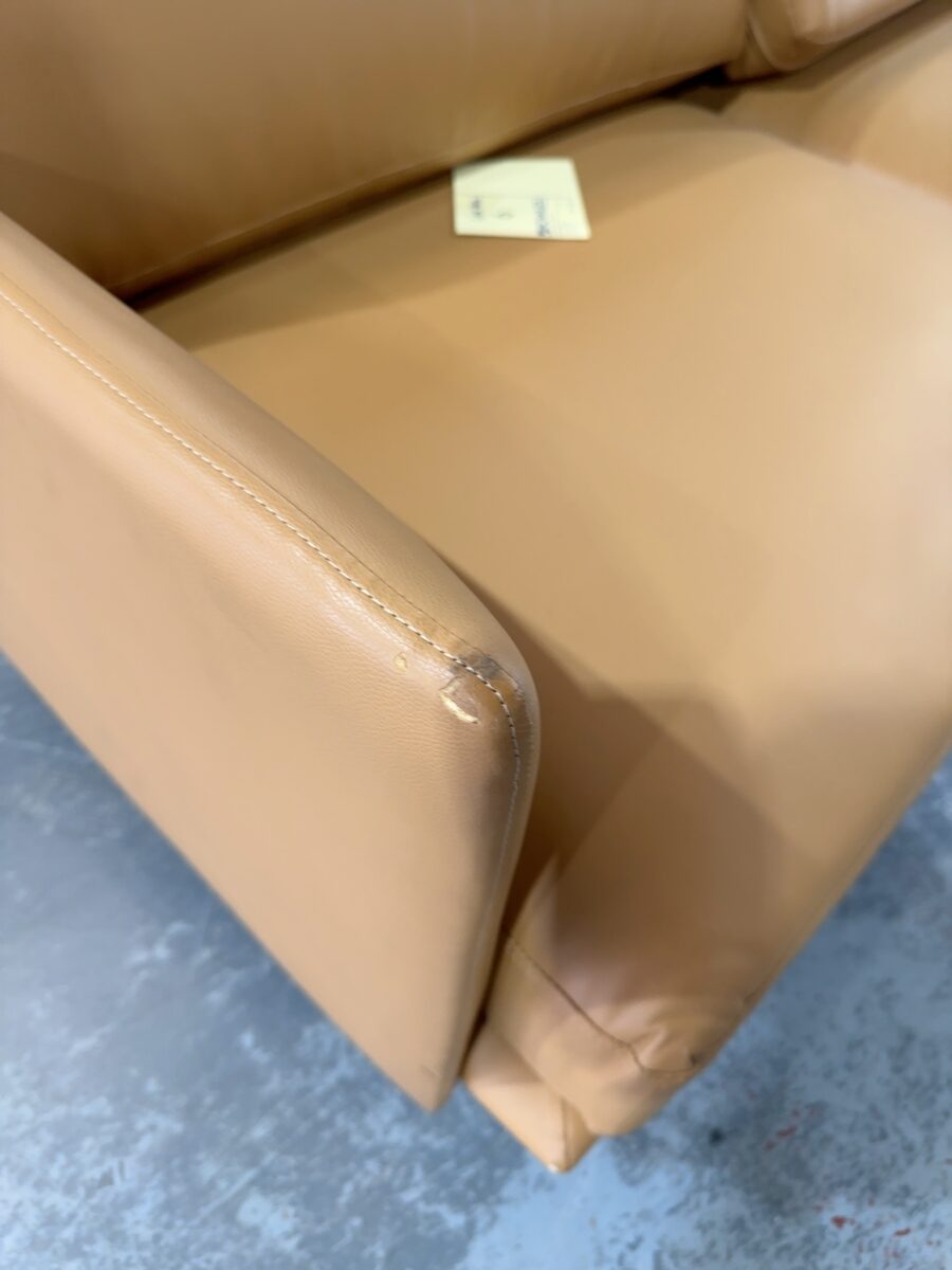 EX STAGING HIRE - TAN VINYL MID CENTURY STYLE 2 SEATER COUCH, SOLD AS IS **SOME SMALL MARKS, RUBS, SCRATCHES**