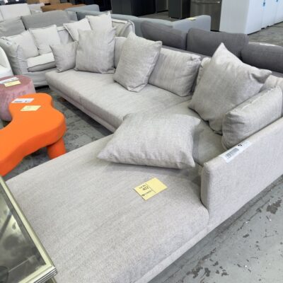 EX STAGING HIRE - LIGHT GREY COUCH WITH CHAISE, SOLD AS IS
