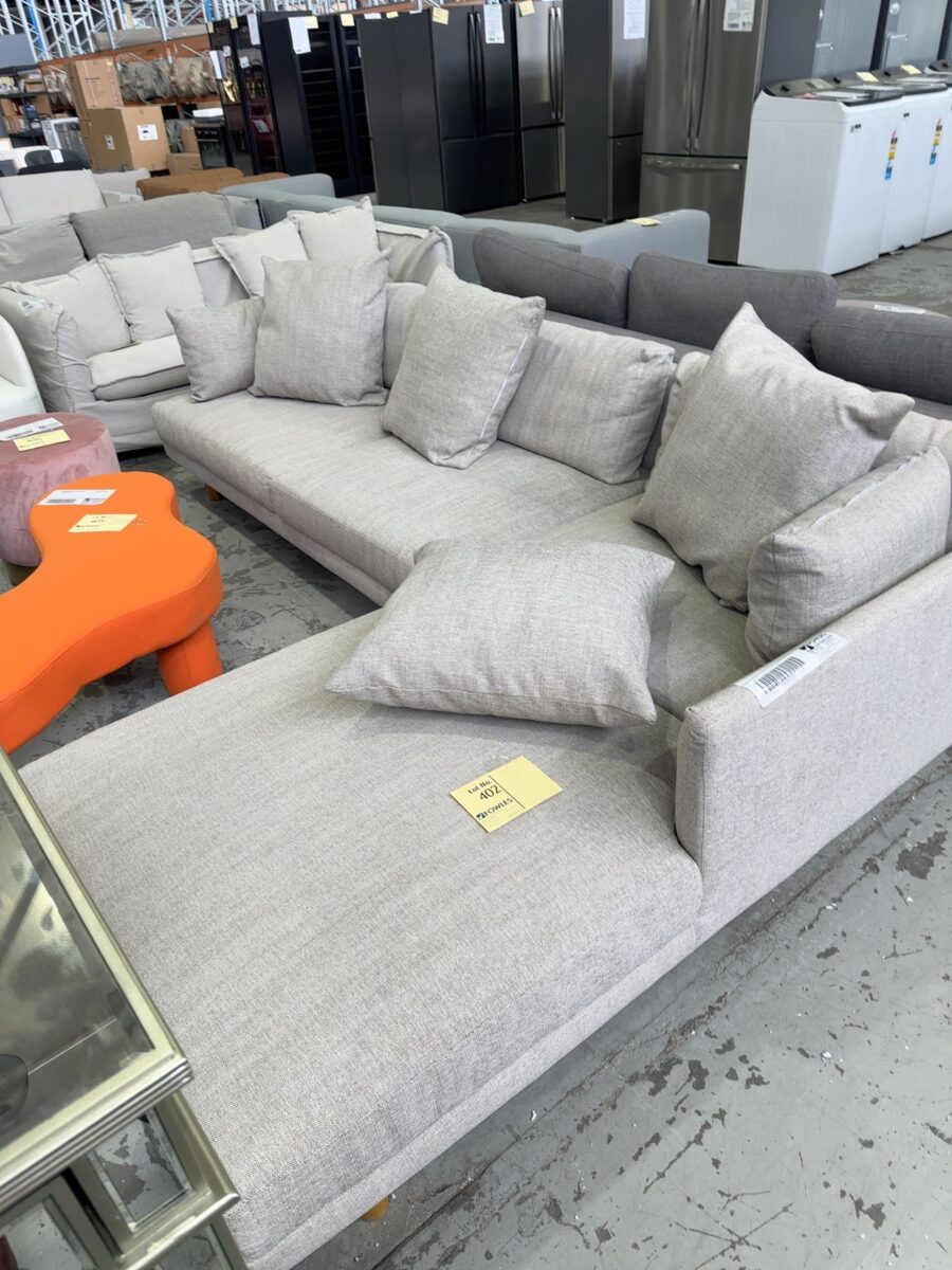 EX STAGING HIRE - LIGHT GREY COUCH WITH CHAISE, SOLD AS IS