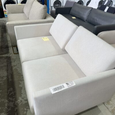 EX STAGING HIRE - CREAM 2 SEATER SOFA SOLD AS IS