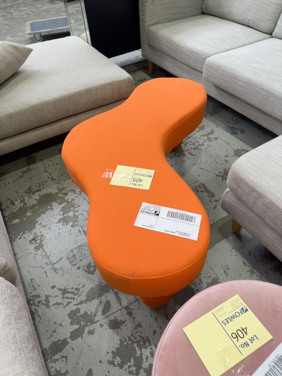 EX STAGING HIRE - ORANGE CURVED OTTOMAN SOLD AS IS