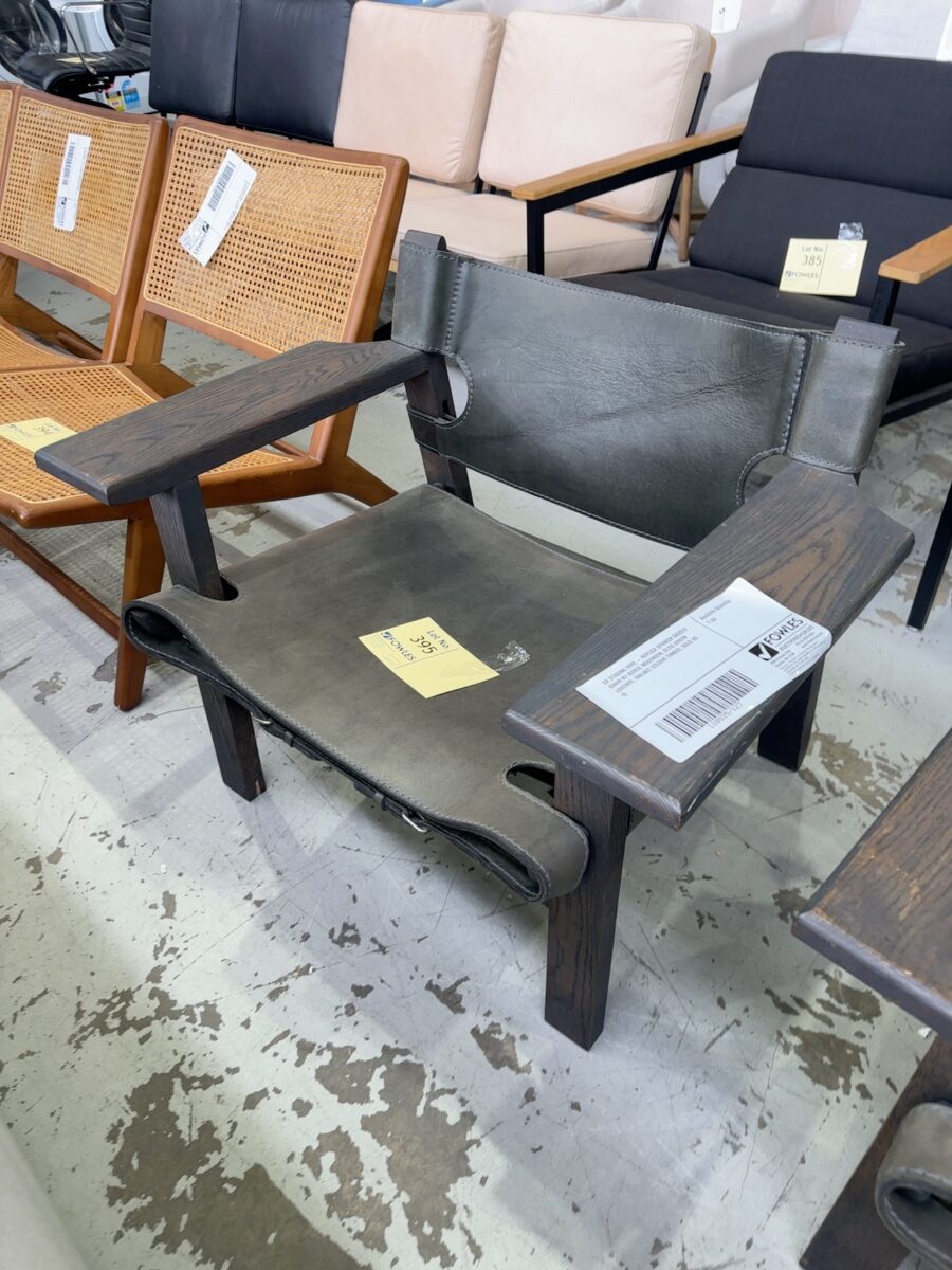 EX STAGING HIRE - REPLICA SPANISH SADDLE CHAIR BY BORGE MOGENSEN, OLIVE GREEN LEATHER, WALNUT COLOUR TIMBER, SOLD AS IS