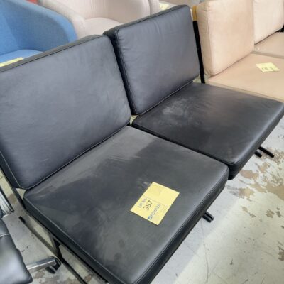 EX STAGING HIRE - BLACK LEATHER CHAIR, SOLD AS IS