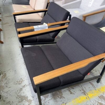 EX STAGING HIRE - BLACK MATERIAL ARM CHAIR WITH TIMBER ARMS, SOLD AS IS