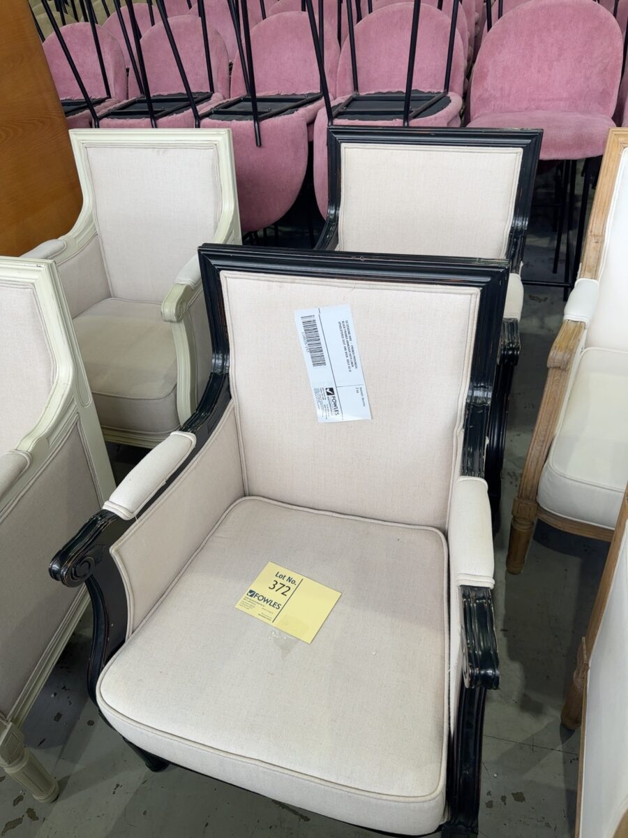 EX STAGING HIRE - FRENCH PROVINCIAL BLACK FRAMED ARMCHAIR WITH LINEN UPHOLSTERED SEAT AND BACK, SOLD AS IS