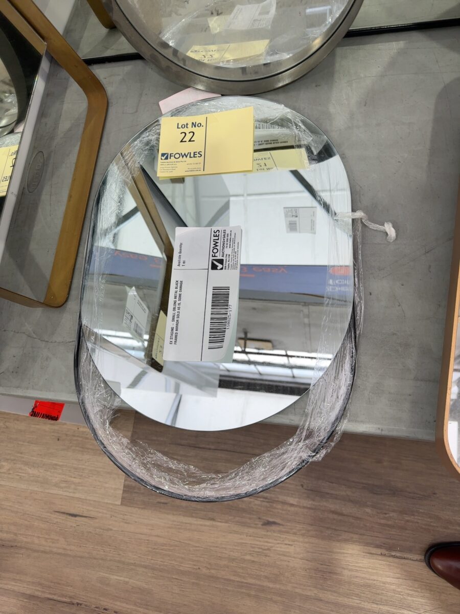 EX STAGING - SMALL OBLONG METAL BLACK FRAMED MIRROR SOLD AS IS, SOME DAMAGE