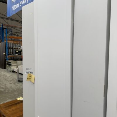 SAMPLE KITCHEN - SET OF 3 WHITE PANTRIES - 2 PLAIN DOOR & 1 SHAKER, SHAKER SQUARE PANTRY WITH PULL OUT MECHANISM, NO BASKETS, OTHER 2 PANTRIES HAVE SHELVES. SOLD AS IS