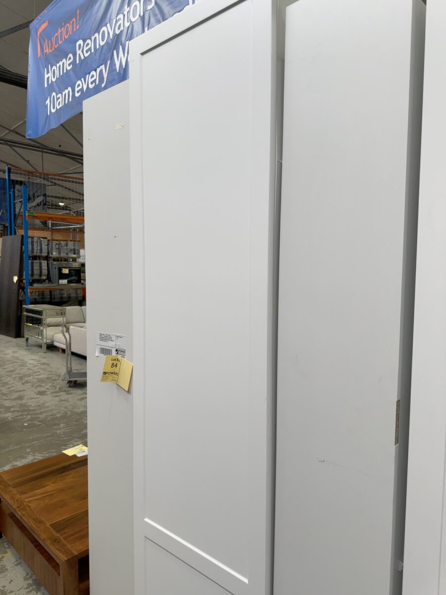 SAMPLE KITCHEN - SET OF 3 WHITE PANTRIES - 2 PLAIN DOOR & 1 SHAKER, SHAKER SQUARE PANTRY WITH PULL OUT MECHANISM, NO BASKETS, OTHER 2 PANTRIES HAVE SHELVES. SOLD AS IS