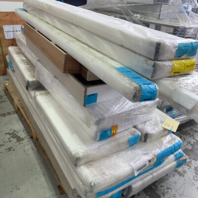 PALLET OF KITCHEN PARTS - KICKERS, FILLERS AND PANELS, SOLD AS IS