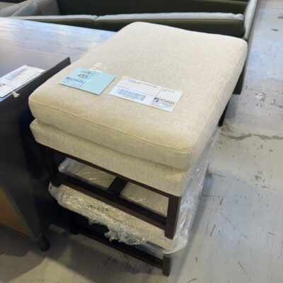 EX STAGING - BEIGE  OTTOMAN WITH TIMBER FRAME, SOLD AS IS