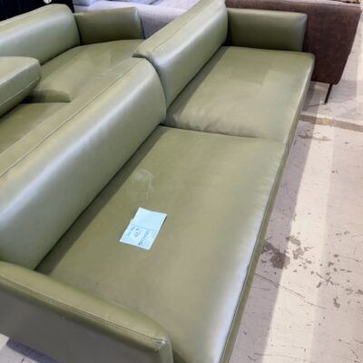 EX STAGING - GREEN VINYL MID CENTURY COUCH, 3 SEATER SOLD AS IS