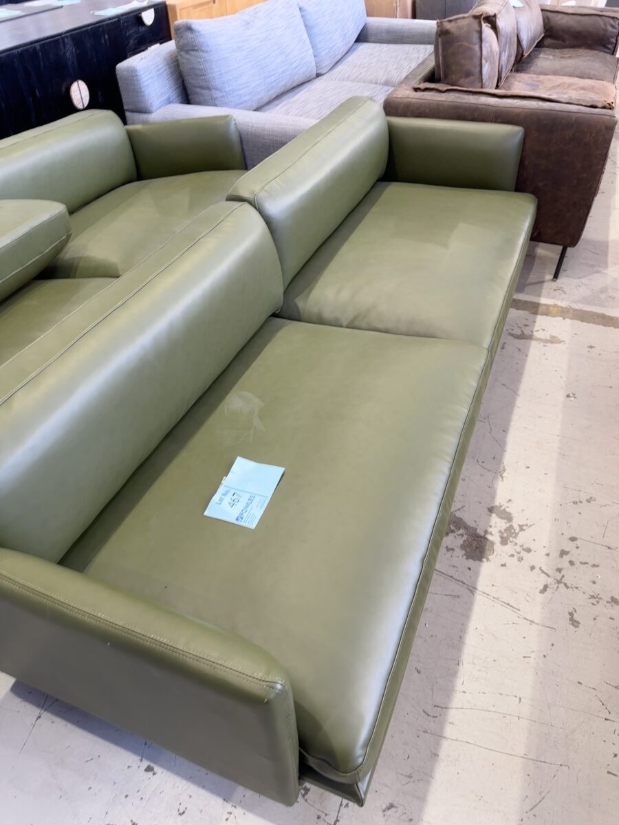 EX STAGING - GREEN VINYL MID CENTURY COUCH, 3 SEATER SOLD AS IS