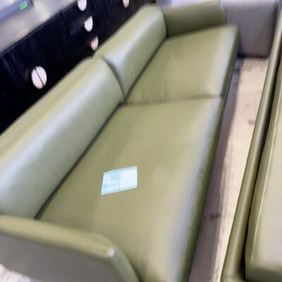 EX STAGING - GREEN VINYL MID CENTURY COUCH, 3 SEATER SOLD AS IS *BROKEN LEG*