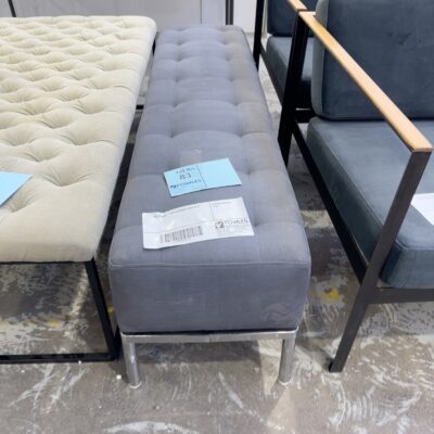 EX STAGING - GREY OTTOMAN, SOLD AS IS