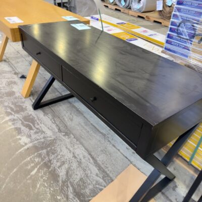 EX STAGING - 1270MM BLACK CROSS LEG DESK SOLD AS IS