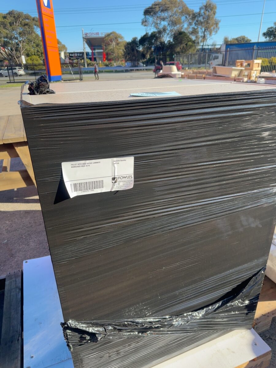 PALLET WITH USED OFFICE LAMINATE BOOKCASES SOLD AS IS