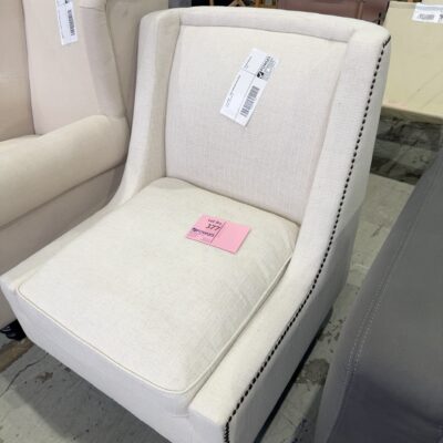 EX STAGING - IVORY ARMCHAIR WITH STUD DETAIL, SOLD AS IS