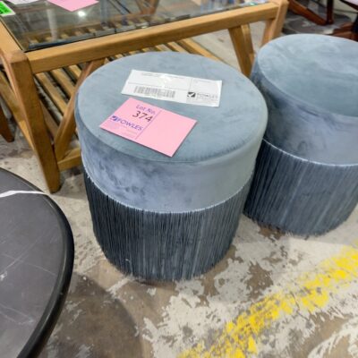 EX STAGING - BLUE ROUND OTTOMAN, WITH FRINGE SOLD AS IS