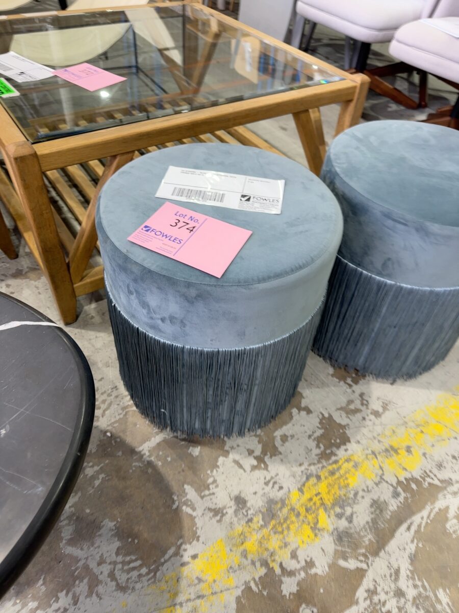 EX STAGING - BLUE ROUND OTTOMAN, WITH FRINGE SOLD AS IS