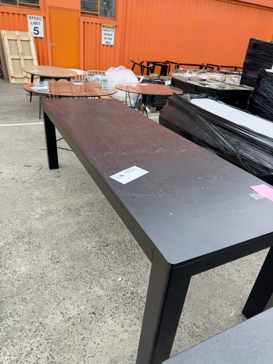 EX HIRE - LARGE BLACK TABLE SOLD AS IS