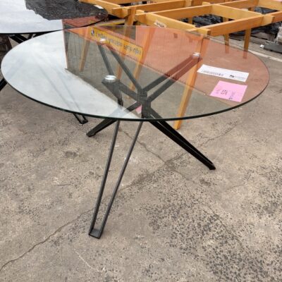 EX HIRE - ROUND GLASS 1200MM TABLE SOLD AS IS