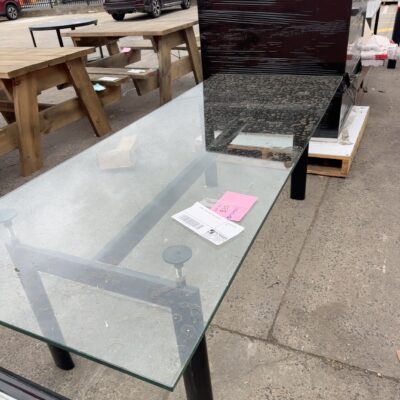 EX HIRE - GLASS DINING TABLE SOLD AS IS