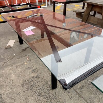 EX HIRE - GLASS DINING TABLE SOLD AS IS