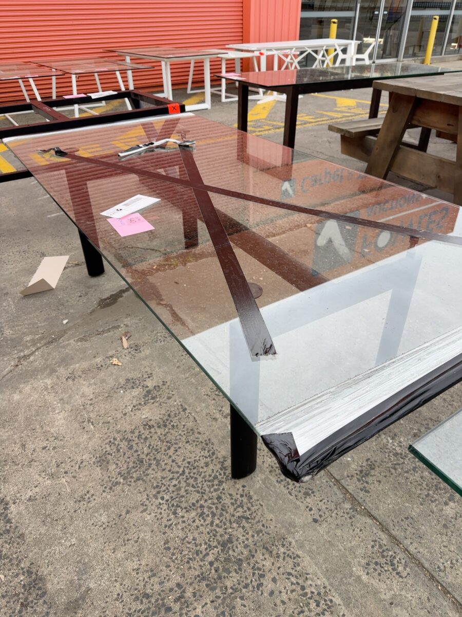 EX HIRE - GLASS DINING TABLE SOLD AS IS