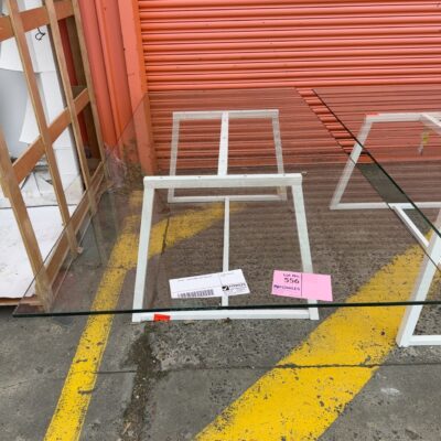 EX HIRE - GLASS DINING TABLE SOLD AS IS