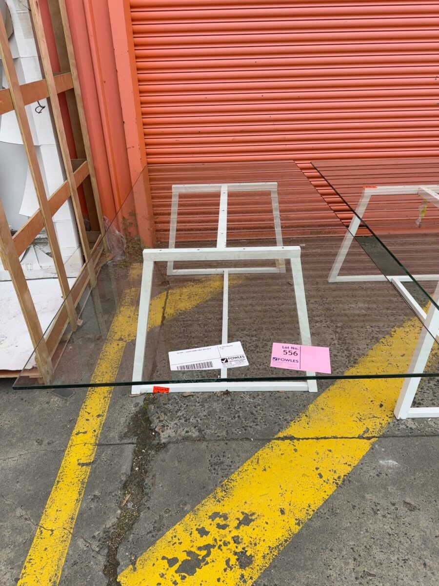 EX HIRE - GLASS DINING TABLE SOLD AS IS