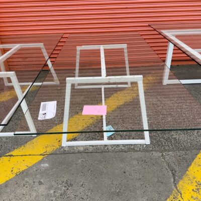 EX HIRE - GLASS DINING TABLE SOLD AS IS