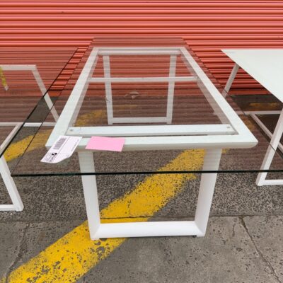 EX HIRE - GLASS DINING TABLE SOLD AS IS