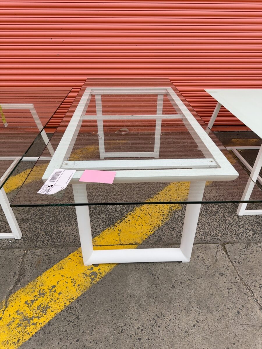 EX HIRE - GLASS DINING TABLE SOLD AS IS