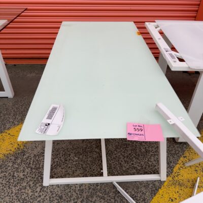 EX HIRE - SMALL GLASS DINING TABLE SOLD AS IS