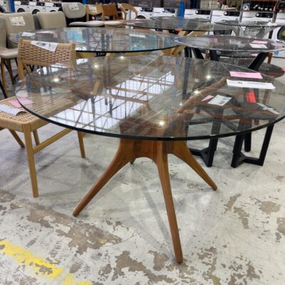 EX STAGING - 1200MM ROUND GLASS DINING TABLE WITH TIMBER BASE SOLD AS IS