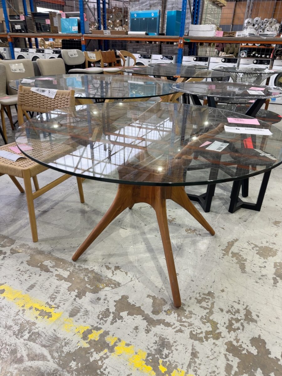 EX STAGING - 1200MM ROUND GLASS DINING TABLE WITH TIMBER BASE SOLD AS IS