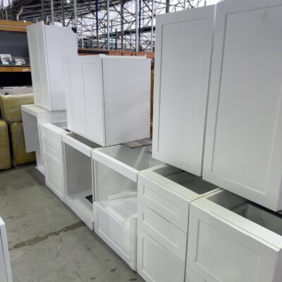 SAMPLE KITCHEN - GALLEY KITCHEN WITH ISLAND BENCH, WHITE MATTE SHAKER SQUARE DOORS, WITH PULL OUT PANTRY SOLD AS IS, KITCHEN CABINETS CAN BE ARRANGED IN ANY LAYOUT.