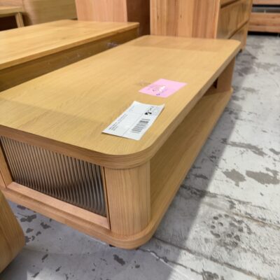 SAMPLE FURNITURE - ASTON AMERICAN OAK 1300MM COFFEE TABLE WITH FLUTED GLASS, SOLD AS IS