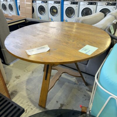 EX STAGING - 1200MM ROUND TIMBER DINING TABLE, SOLD AS IS