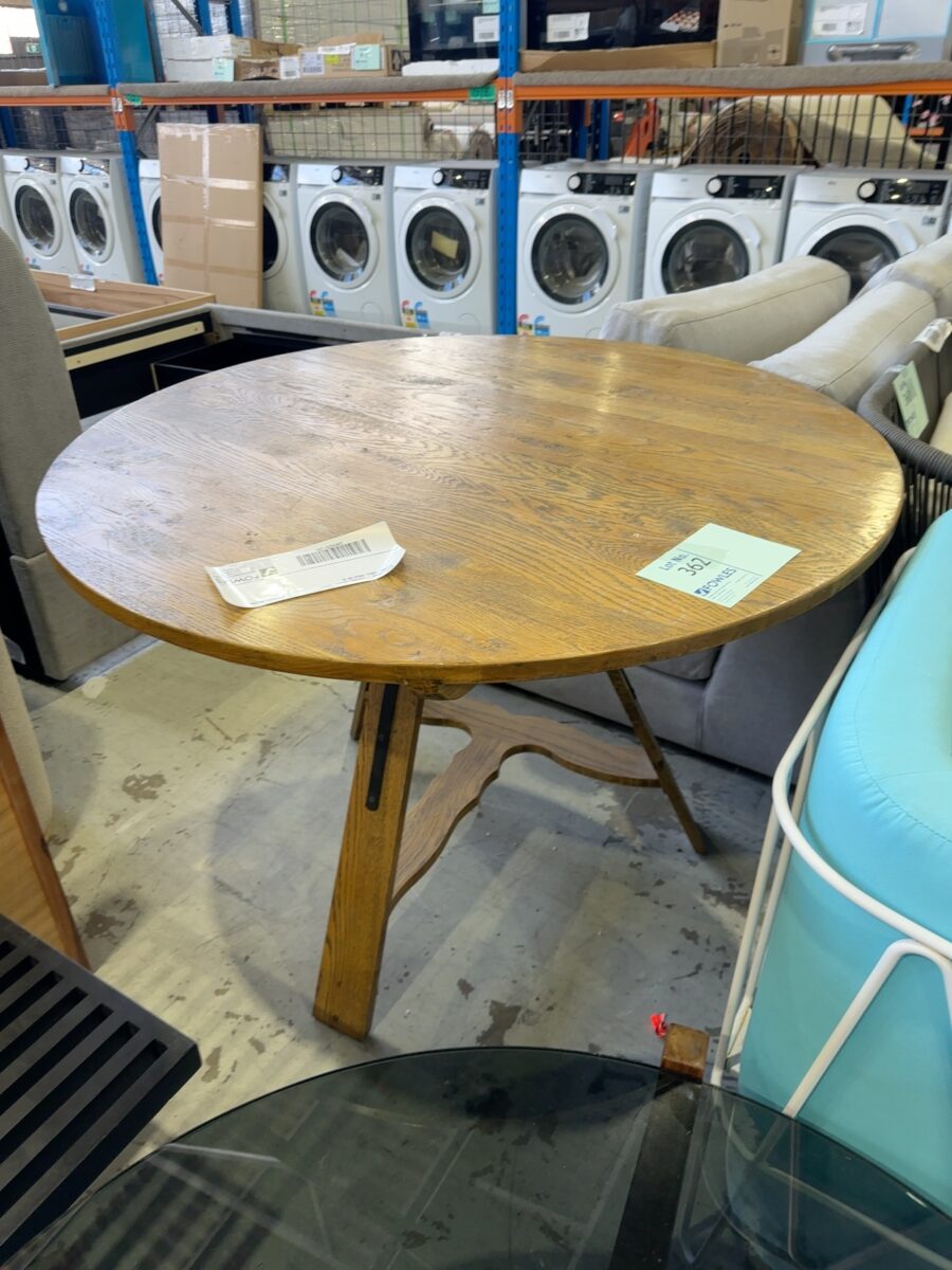 EX STAGING - 1200MM ROUND TIMBER DINING TABLE, SOLD AS IS