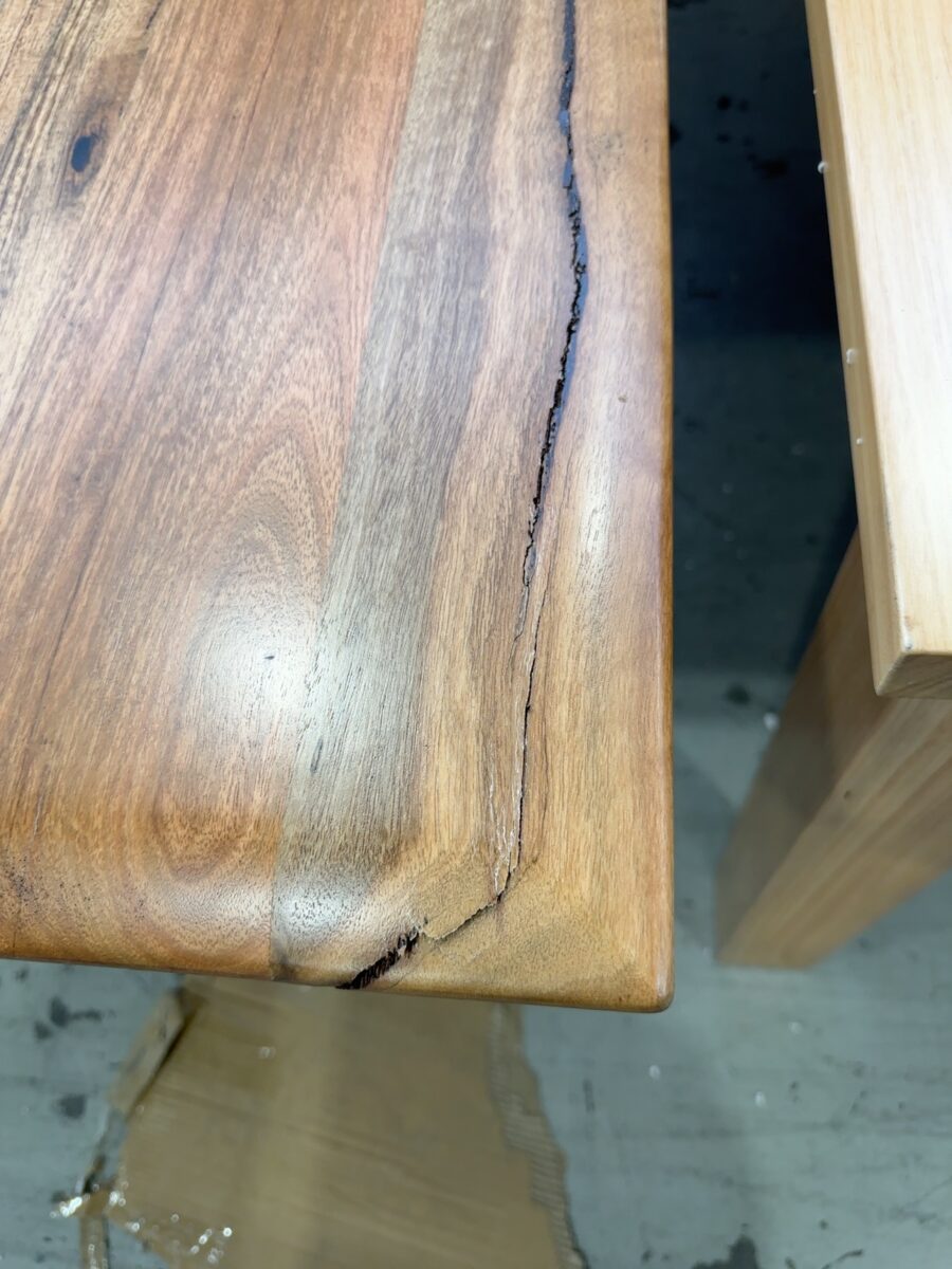 EX DISPLAY MARRI TIMBER 2500MM DINING TABLE - CRACK IN TABLE IN TIMBER VEIN - WILL NEED REPAIR, SOLD AS IS