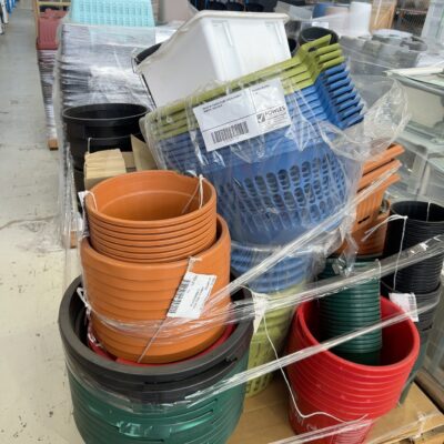 PALLET OF PLASTIC PLANT POTS & LAUNDRY BASKETS, SOLD AS IS