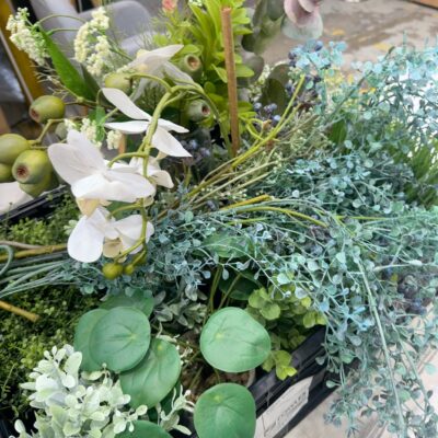 EX STAGING - BOX OF ASSORTED FAUX PLANTS, SOLD AS IS