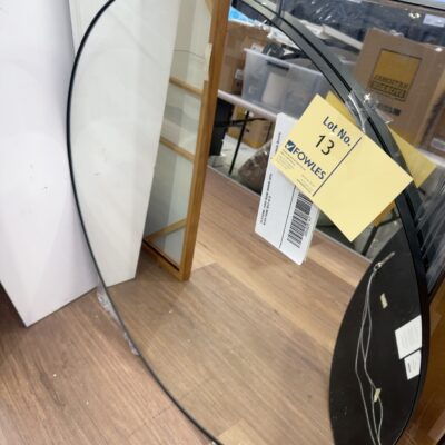 EX STAGING, LARGE ROUND MIRROR WITH BLACK FRAME SOLD AS IS