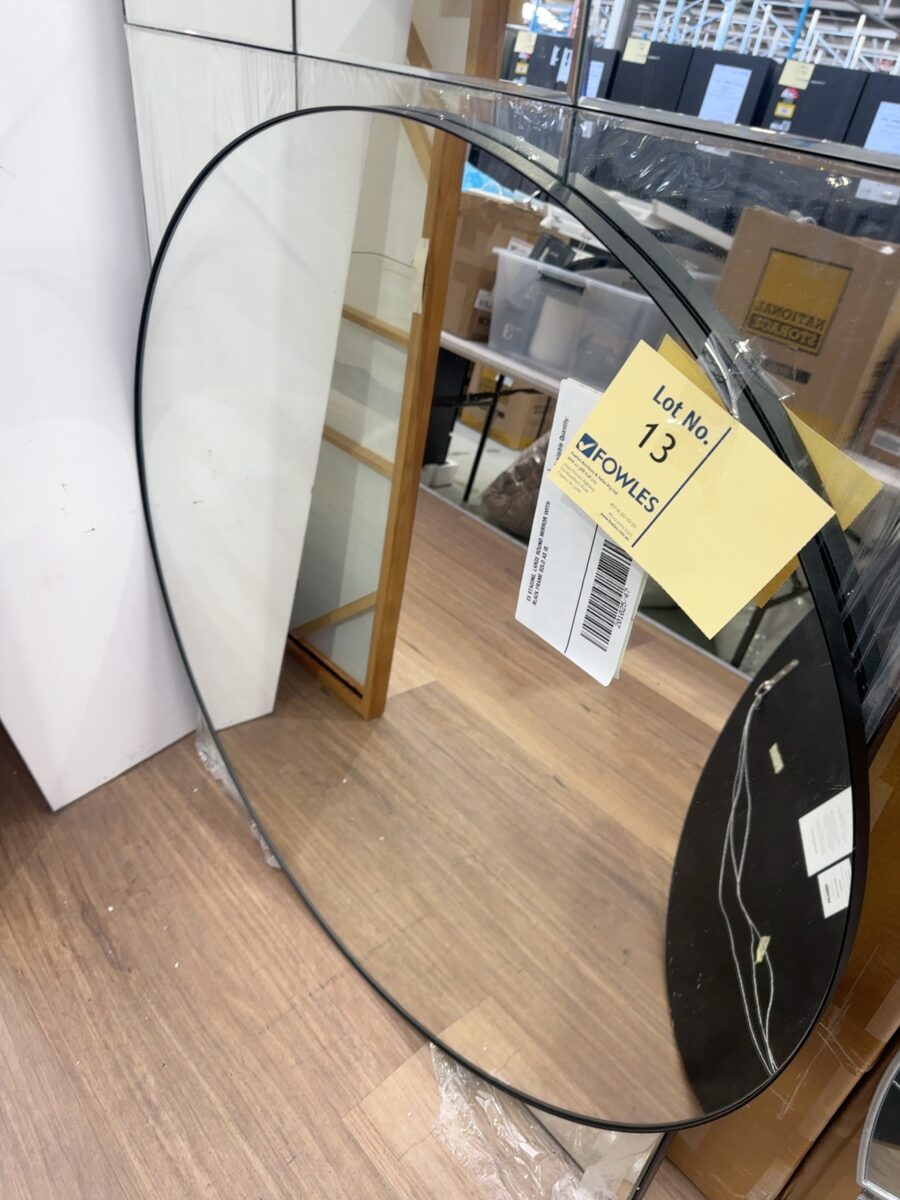 EX STAGING, LARGE ROUND MIRROR WITH BLACK FRAME SOLD AS IS