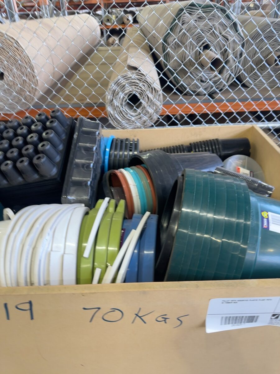 PALLET WITH ASSORTED PLASTIC PLANT POTS IN TIMBER BOX