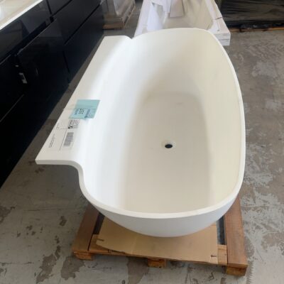 NEW 1800MM WHITE STONE BATH WITH FORMED SHELF, SOLD AS IS